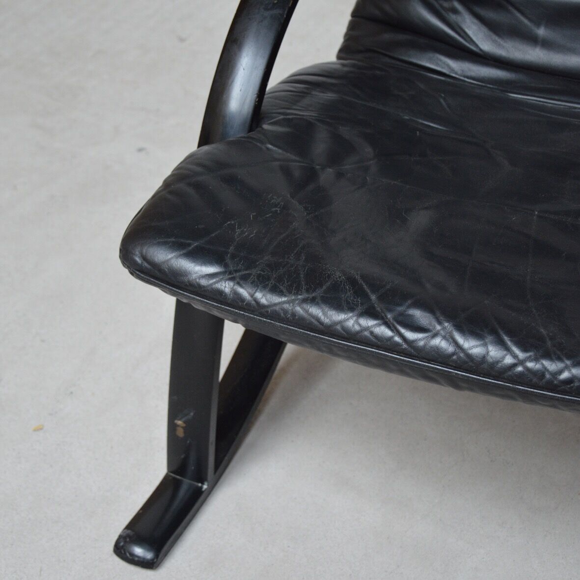 Black leather armchair and canning