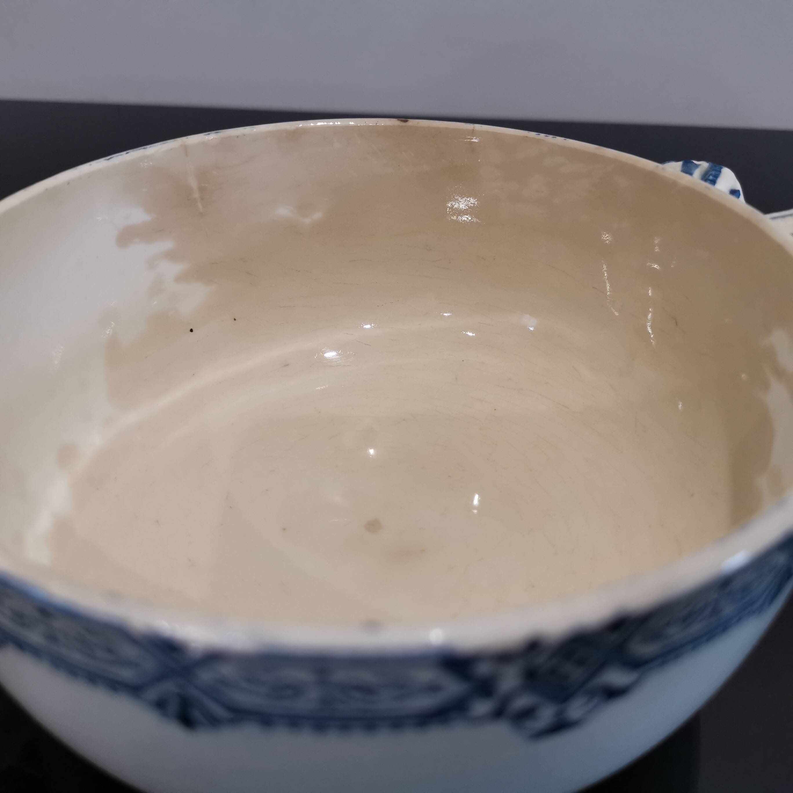 Butterfly ear bowl in iron clay with blue patterns
