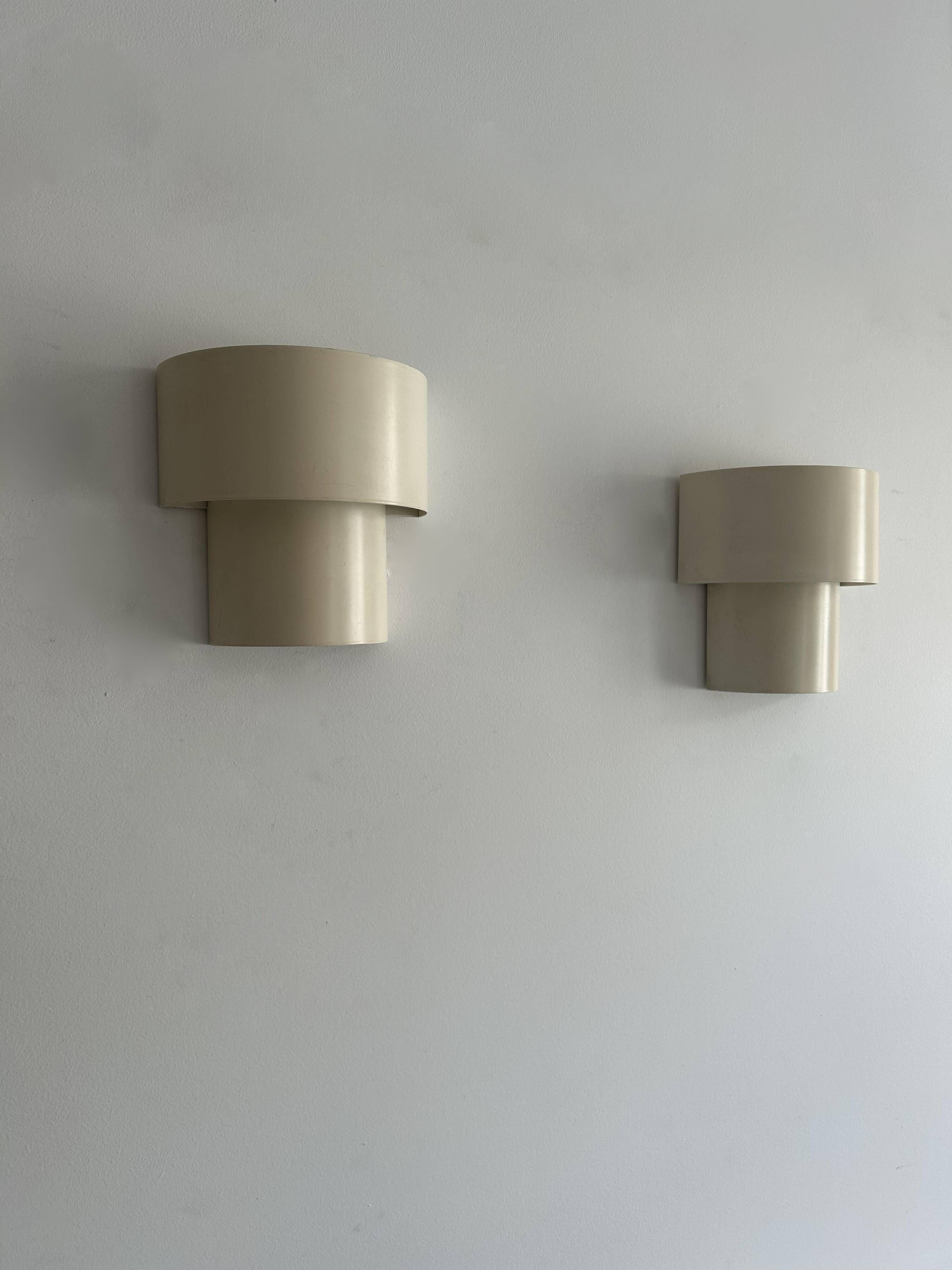 Pair of vintage modernist wall lights, white lacquered metal, Sweden 1970