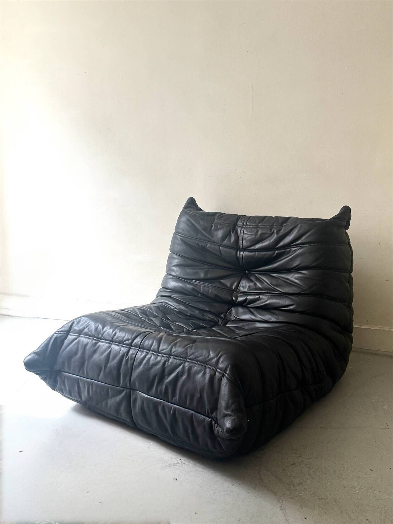Black leather Togo armchair by M. Ducaroy for Ligne Roset
