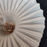 Round pendant light in pleated semi-opaque glass