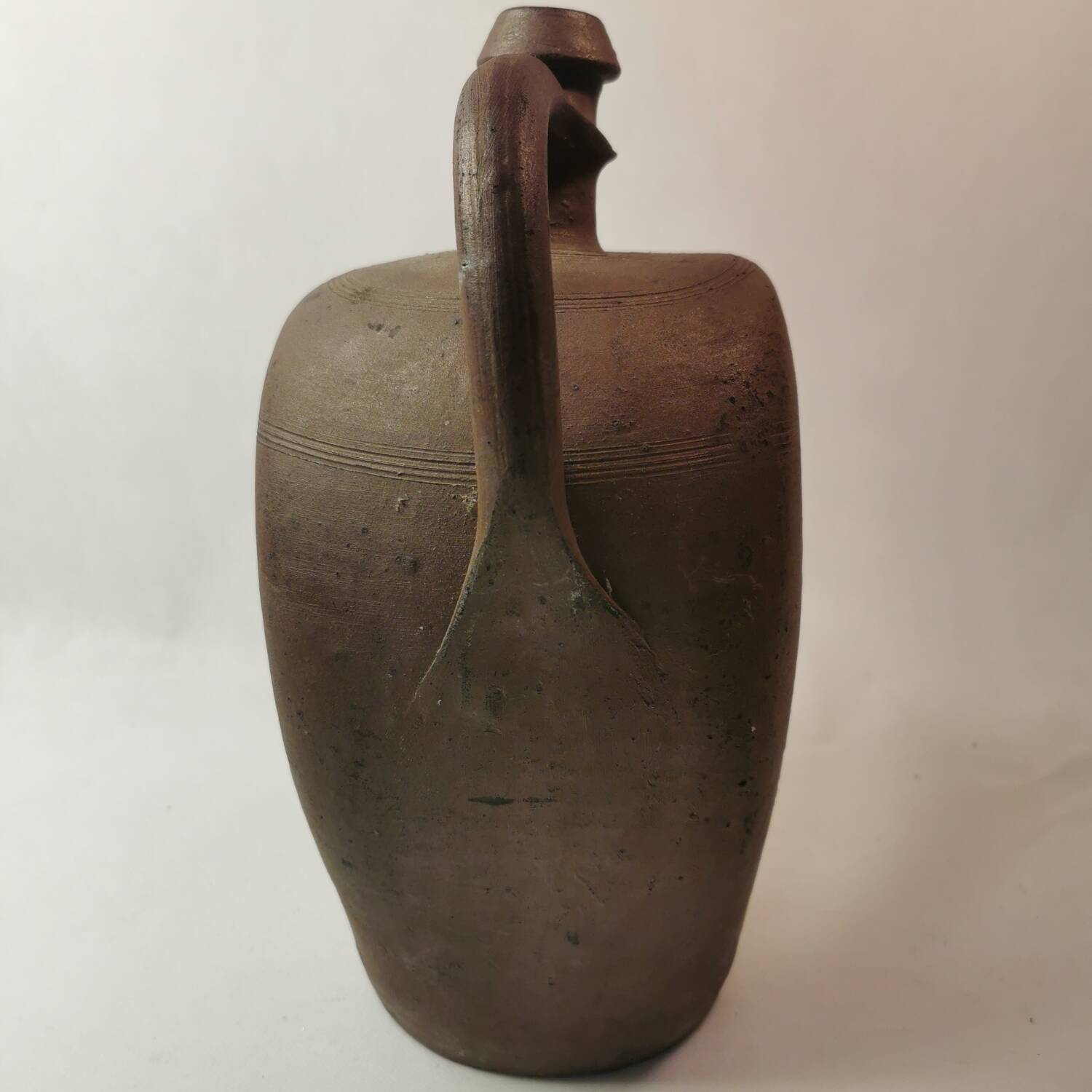 Norman jug bottle with old sandstone handle