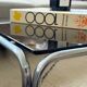 Ancienne table basse chrome et verre fumé vintage
