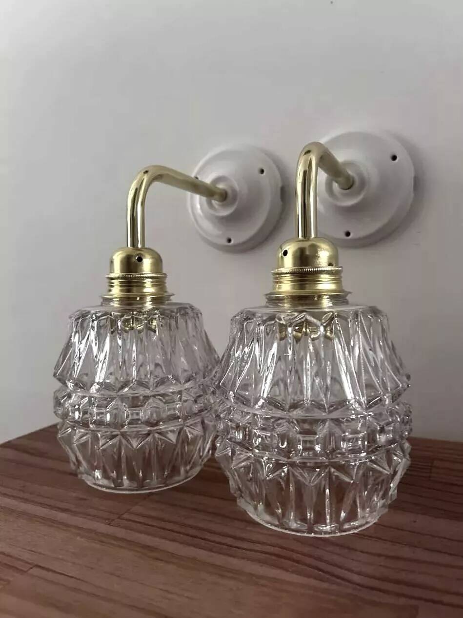 Pair of ceramic and glass wall sconces