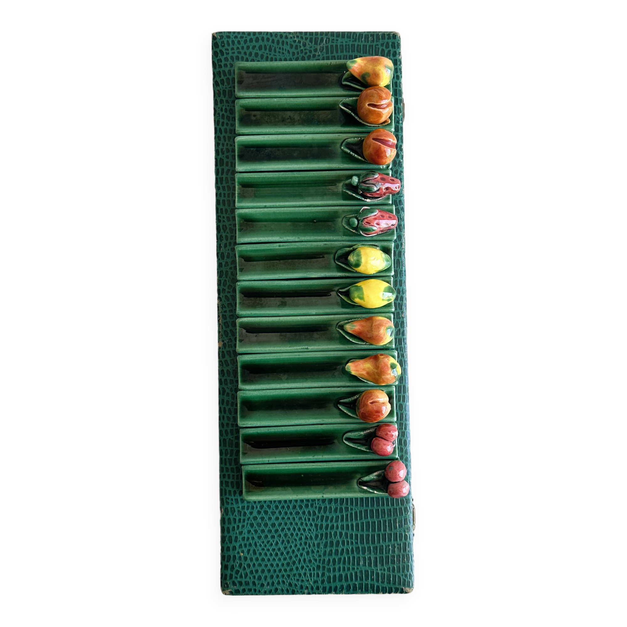 12 ceramic fruit knife holders.