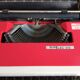 Typewriter "Burelec 315" made in Spain in red and white metal.