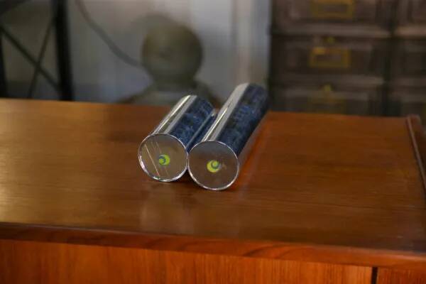 Pair of chrome-plated metal vases, 1960s