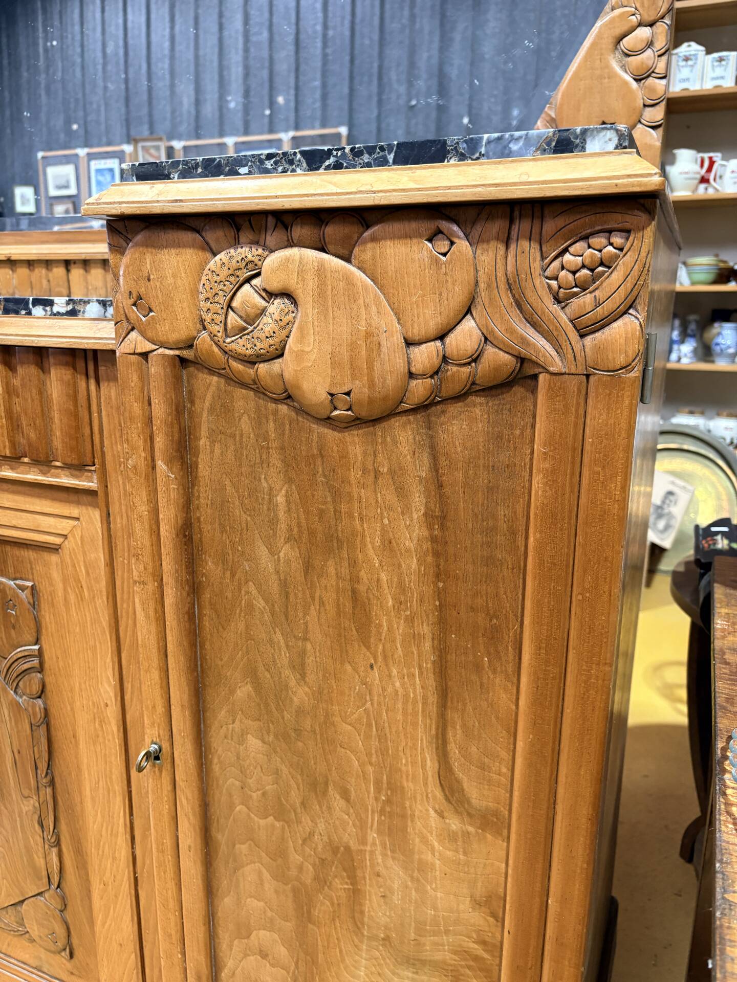 Art Deco buffet in carved walnut, marble and large mirror – 1930s