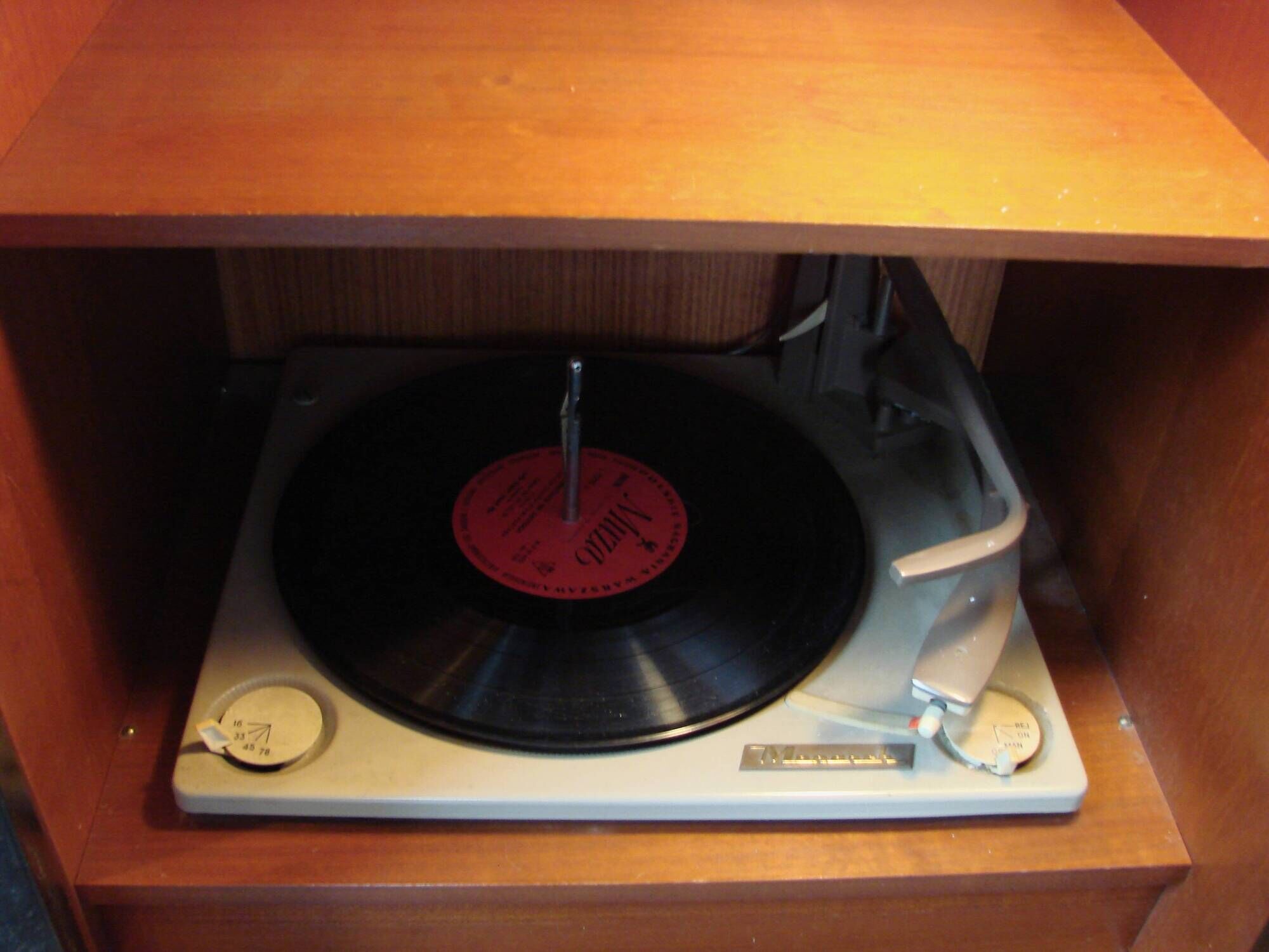 A vintage cabinet with a record player and a bar, 1960s.