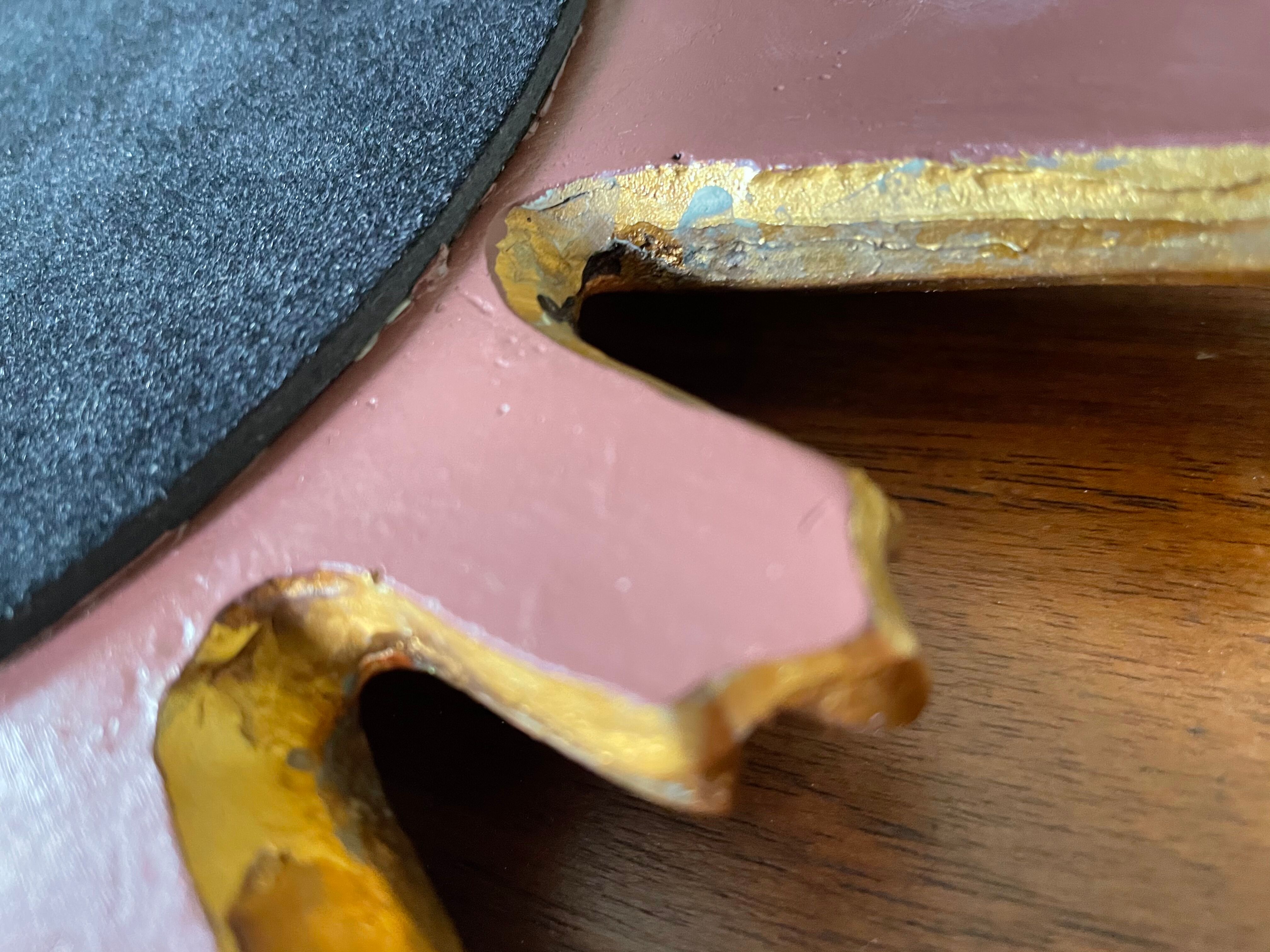 Vintage sun mirror in 60s/70s gold resin