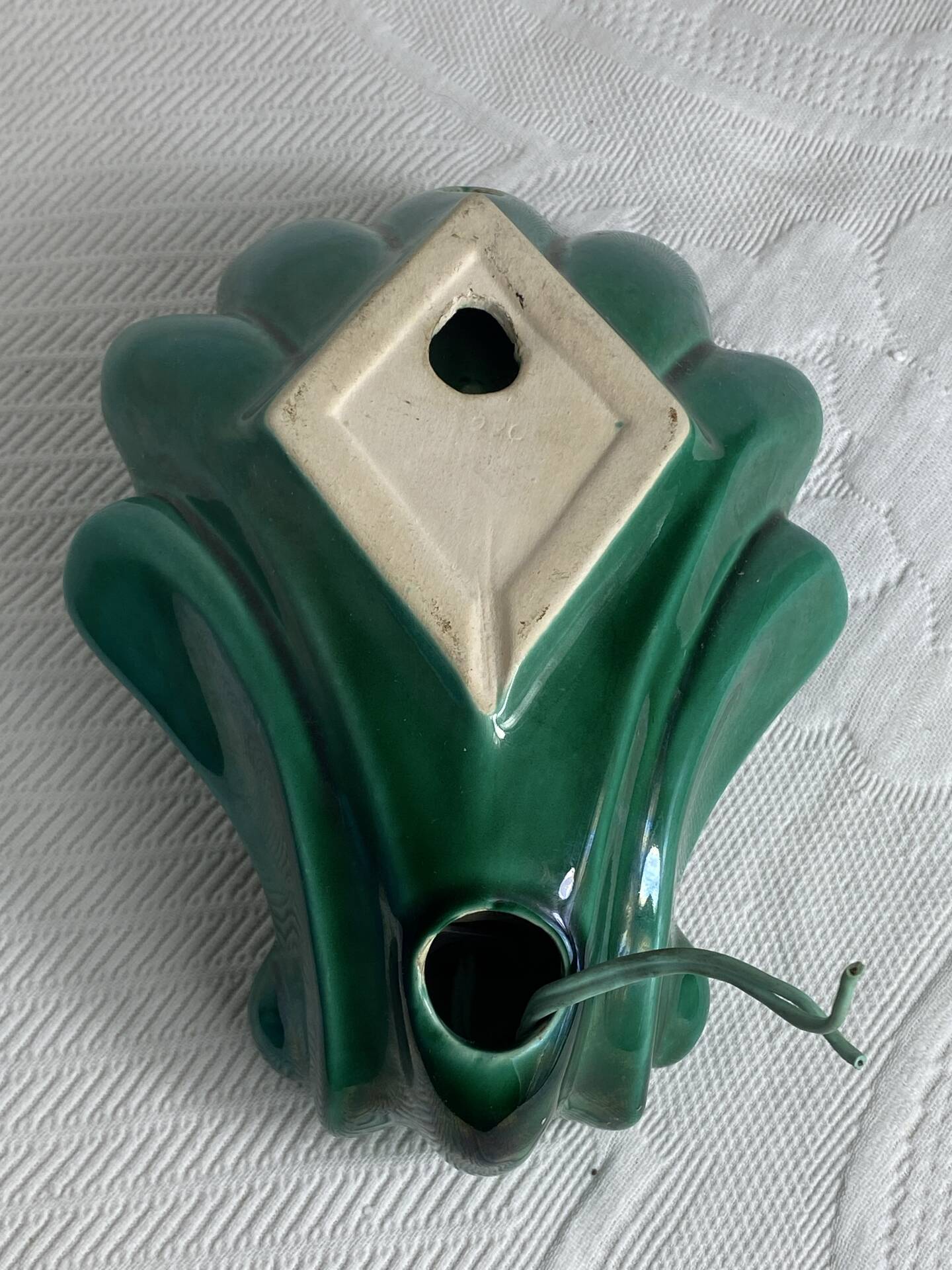 Ceramic shell wall light