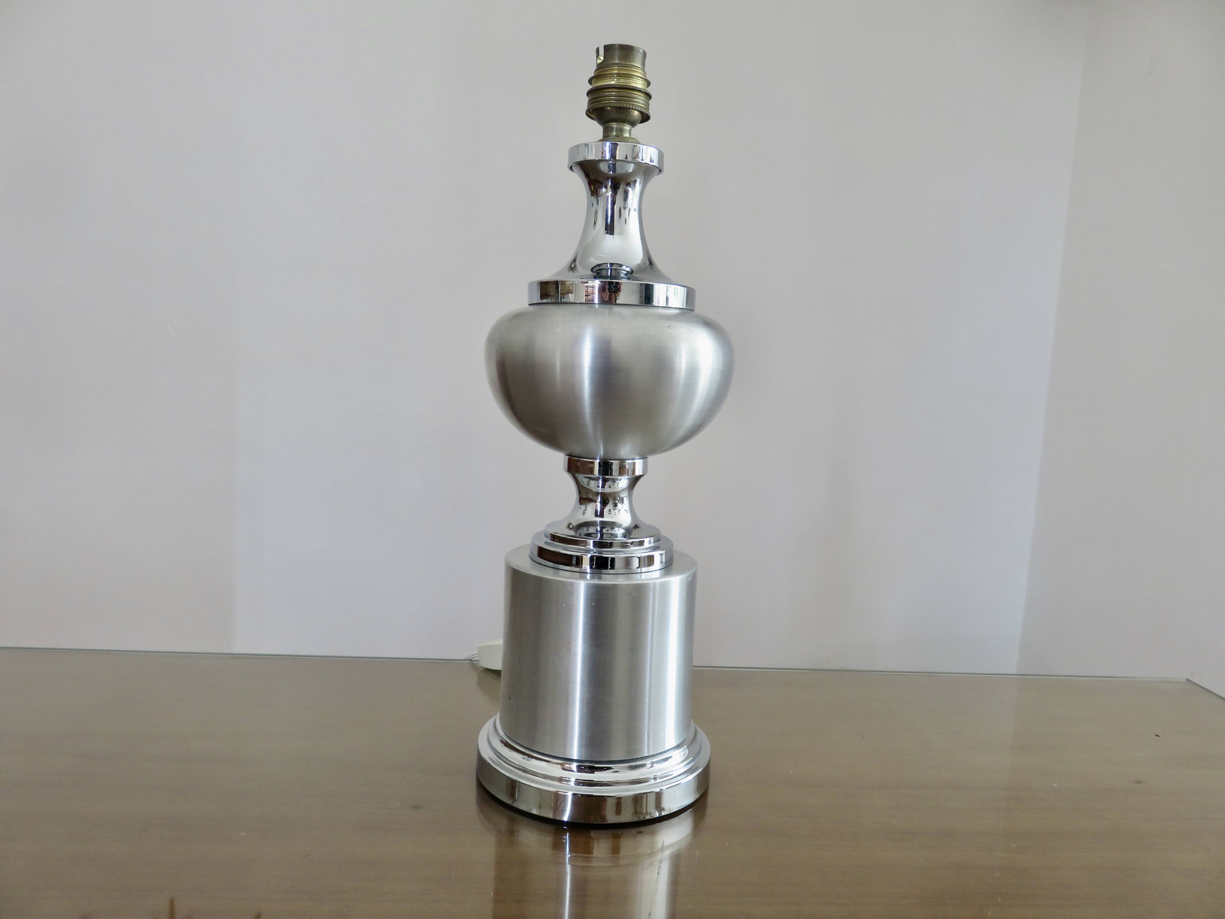 Brushed aluminum and chrome lamp typical of the 70s