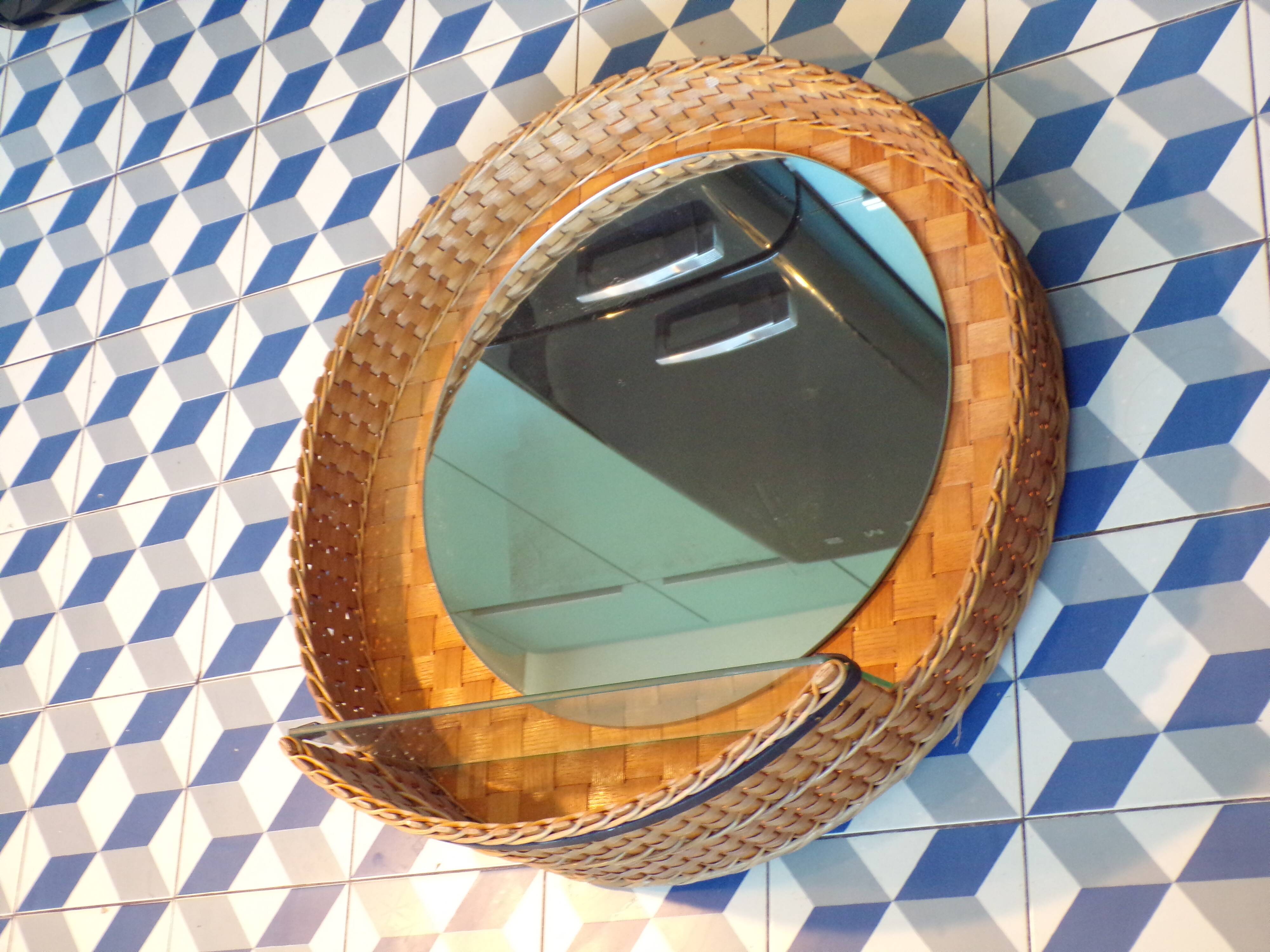 Vintage rattan wall mirror with glass shelf