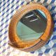 Vintage rattan wall mirror with glass shelf