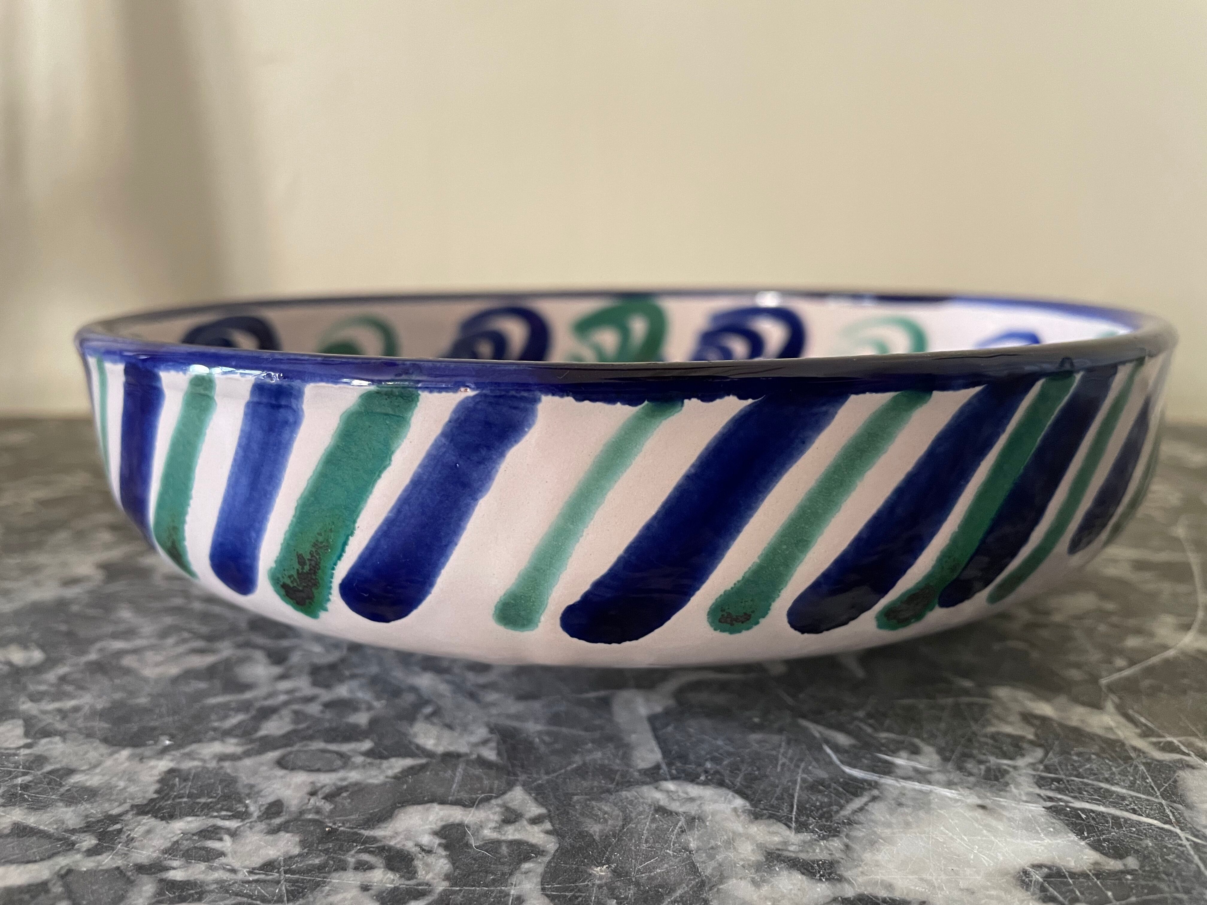 Hollow plate in ceramic from Granada.