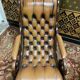 Pair of English Chesterfield leather armchairs