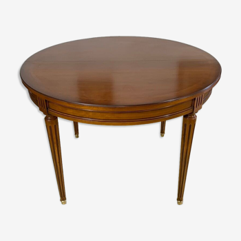 Louis XVl style round table in cherry with extensions
