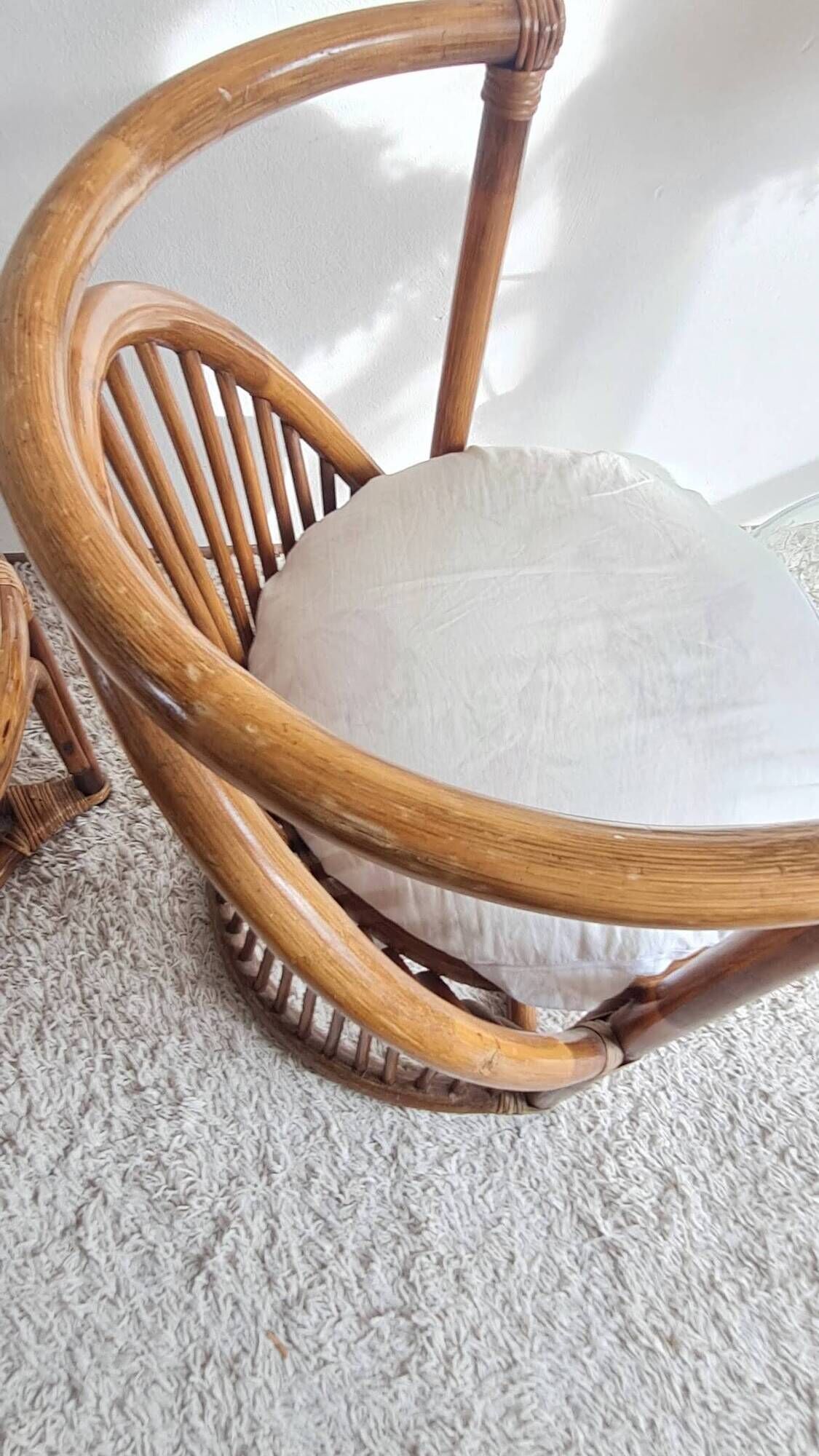 Pair of vintage rattan armchairs circa the 1960s.