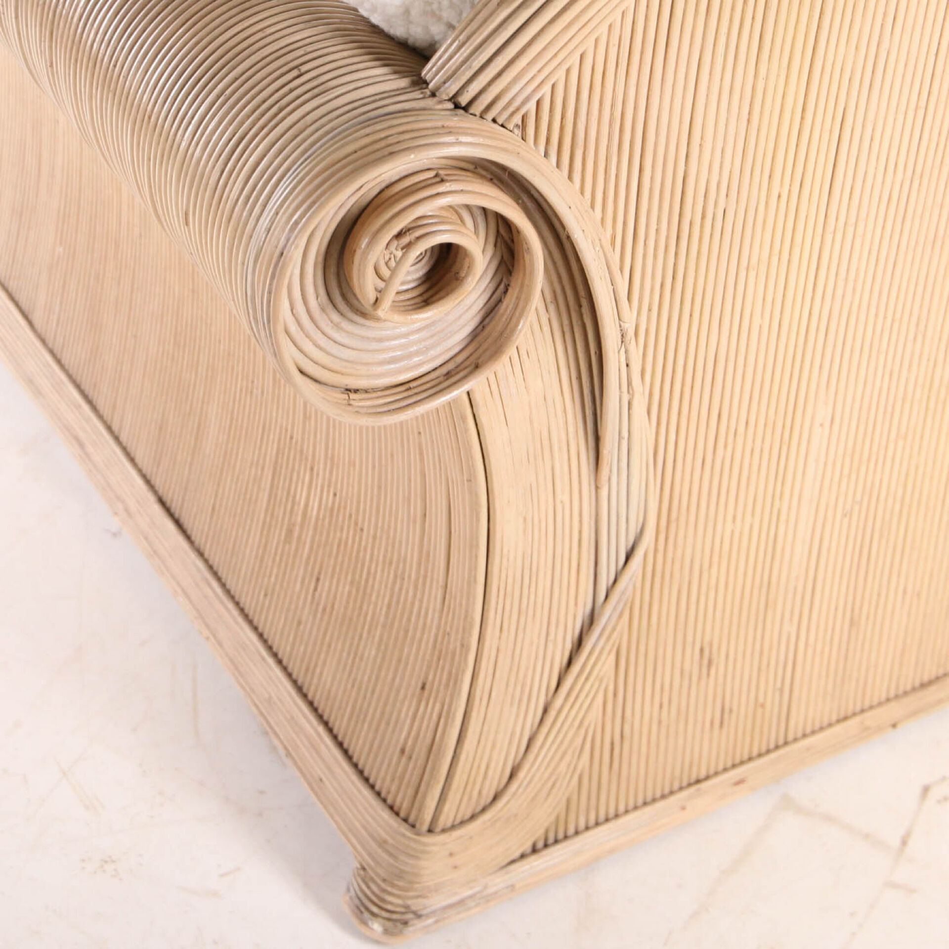 Rattan armchair by Betty Cobonpue