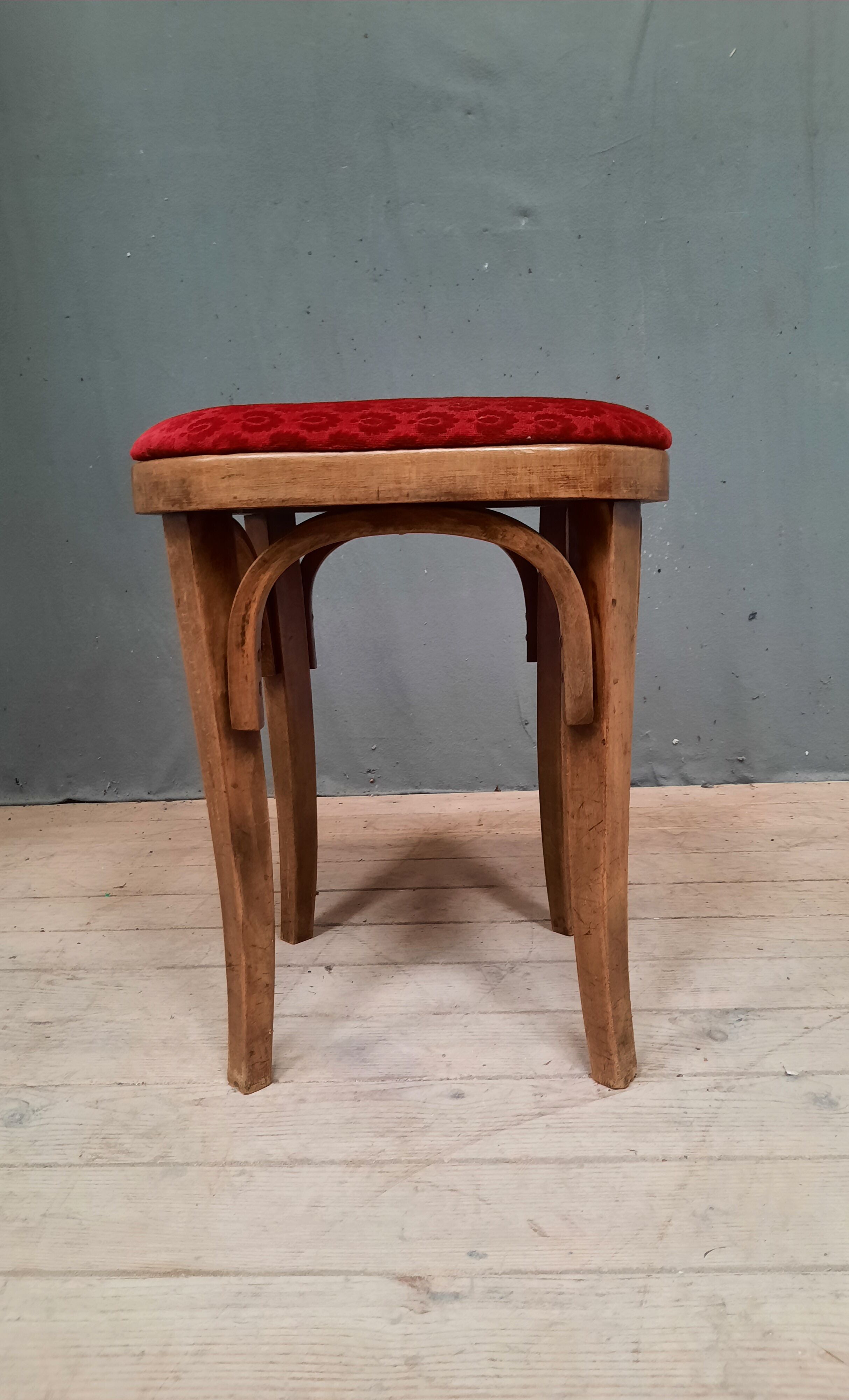 Curved wooden stool