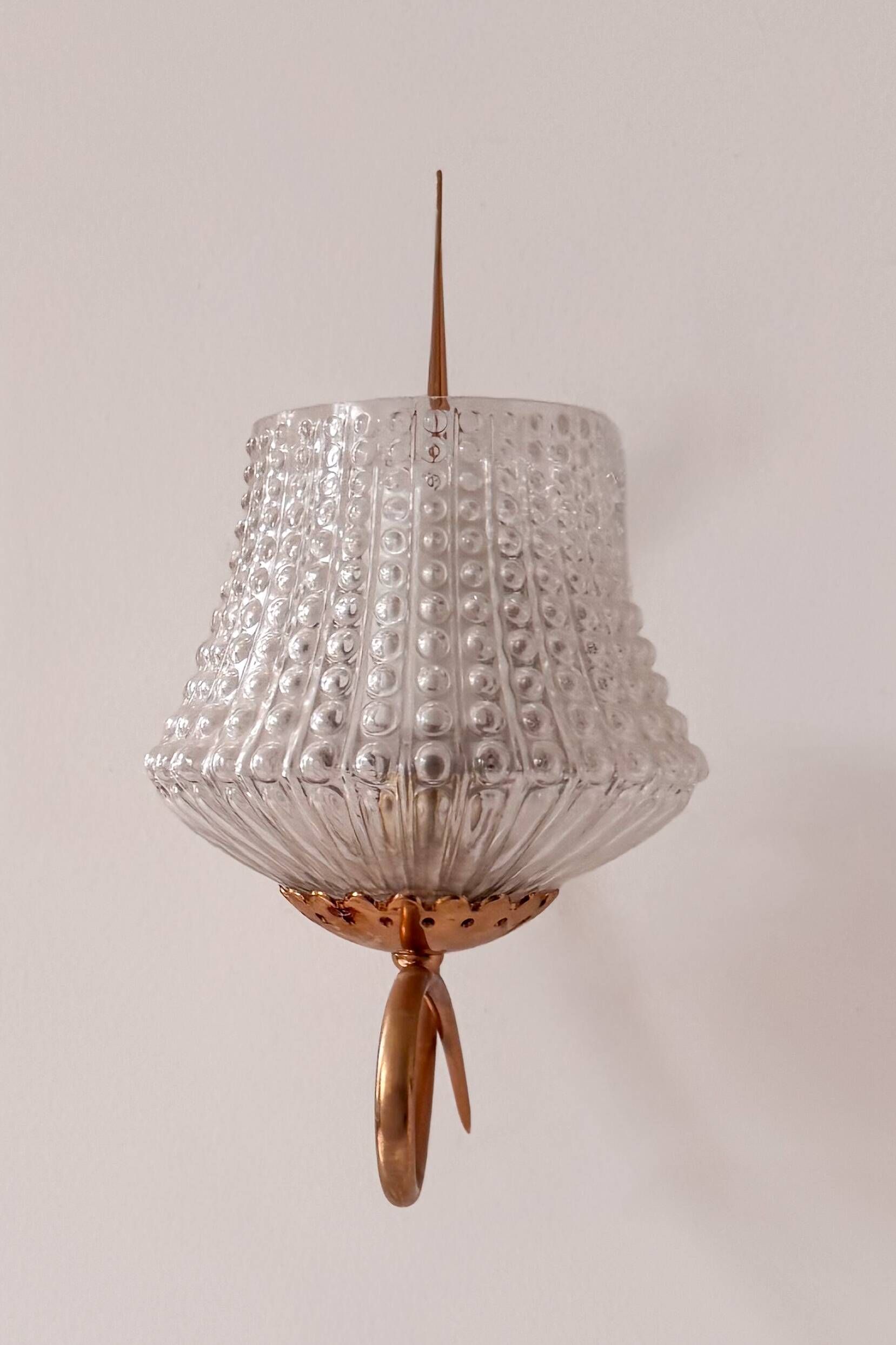 Vintage brass and glass wall lights, France 1950.