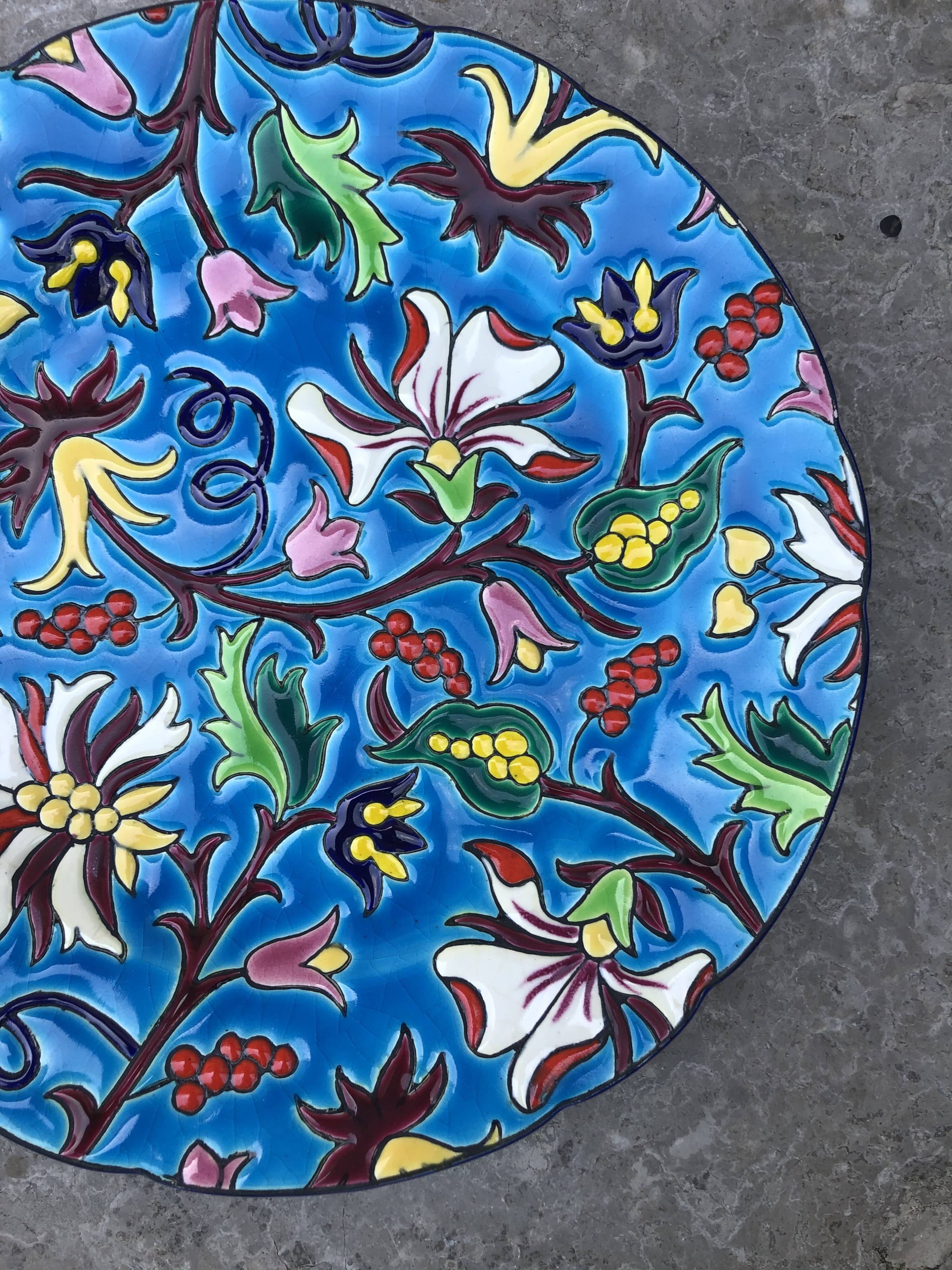 Plate in earthenware has naturalistic décor Longwy emaux