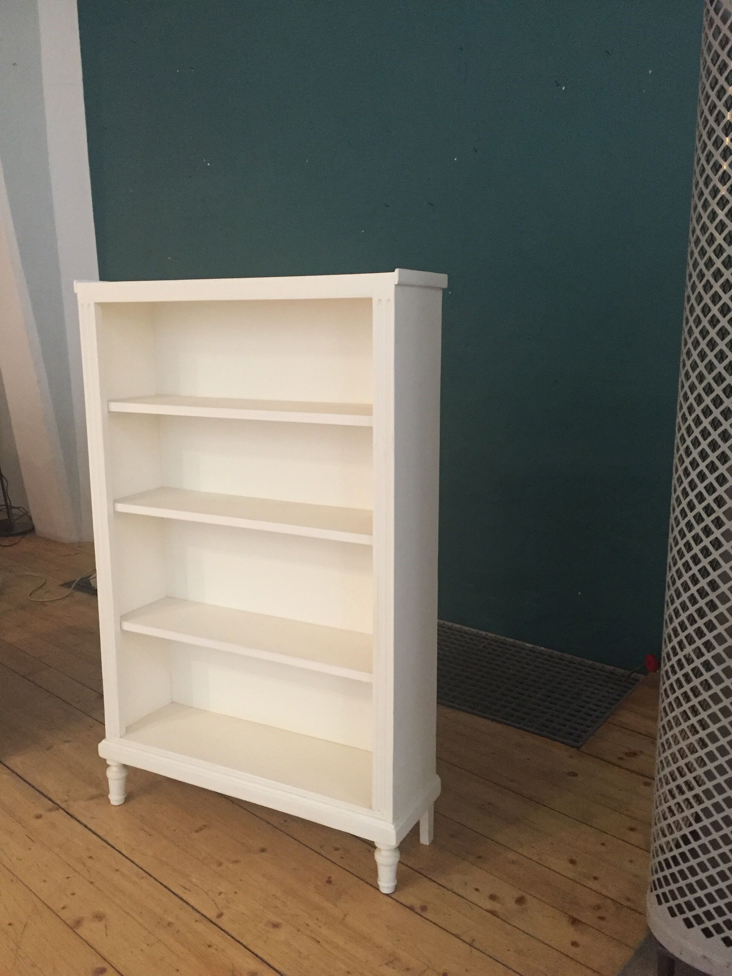 Old bookcase shelf matte white color