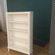 Old bookcase shelf matte white color