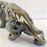Art Deco lion statue 1930 cracked Saint Clément