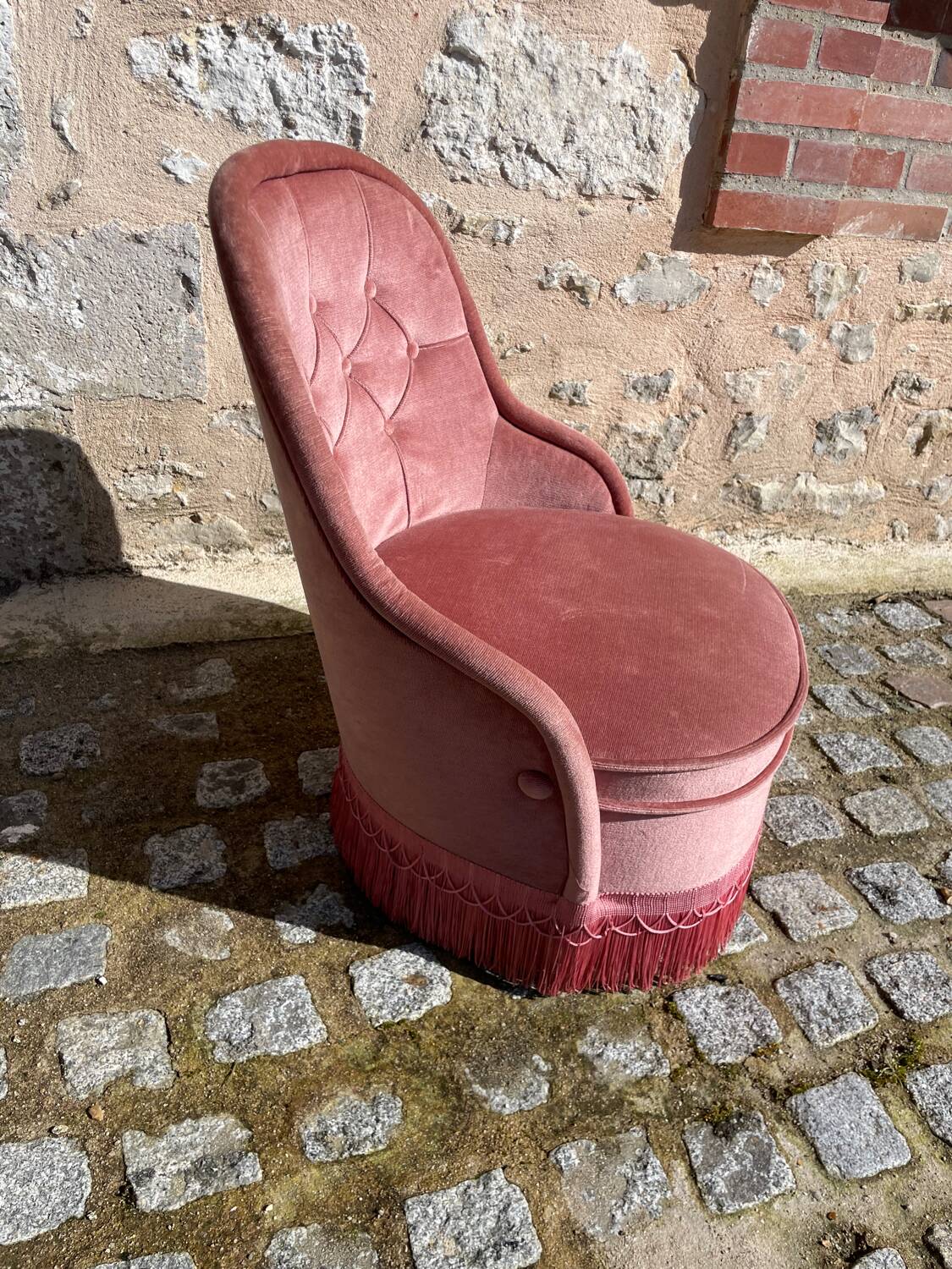 Pink velvet armchair