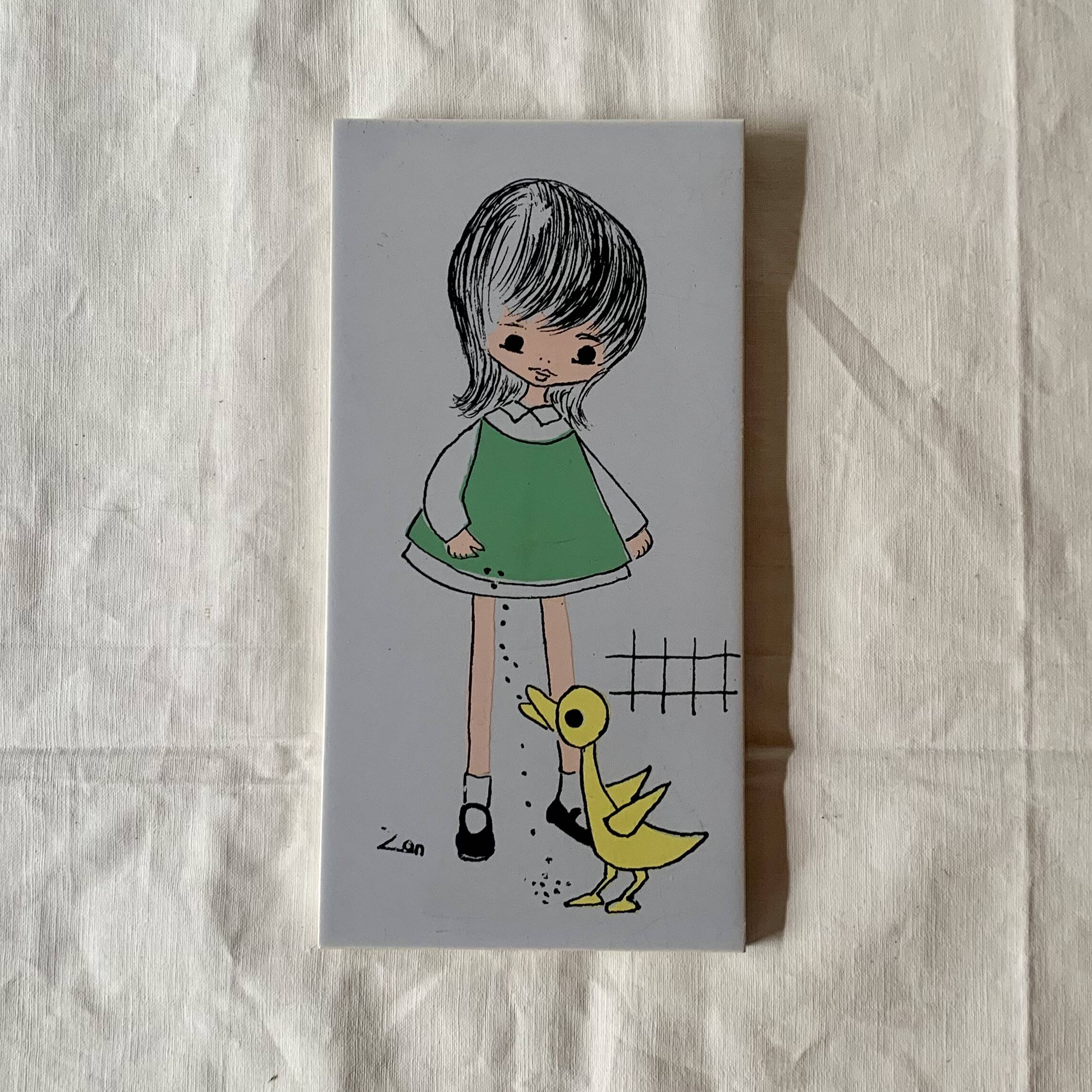 Pair of painted tile wall plates for children's bedroom