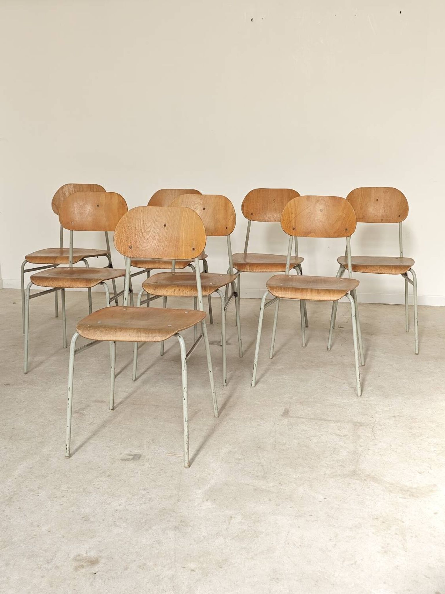 Set of 8 metal and wood school chairs  
Ex Czechoslovakia 1960