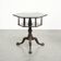 Antique wooden English rotating book table/side table from the 19th century