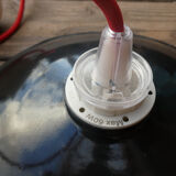 Black hanging lamp in enamelled sheet metal