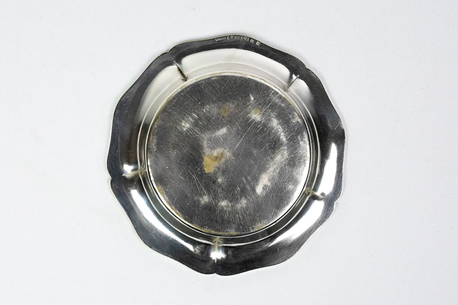 Christofle silver-plated bottle coaster, with ribbed edges, 19th century.