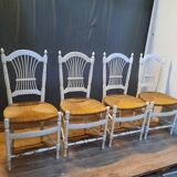 Series of 4 white straw chairs countryside