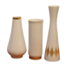 Trio of vases in white and gold porcelain