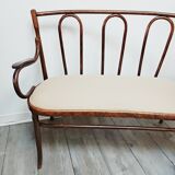 Sofa in curved wood Fischel