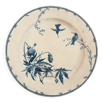 Round serving dish model Birds Mouches of the earthenware factory of Gien.