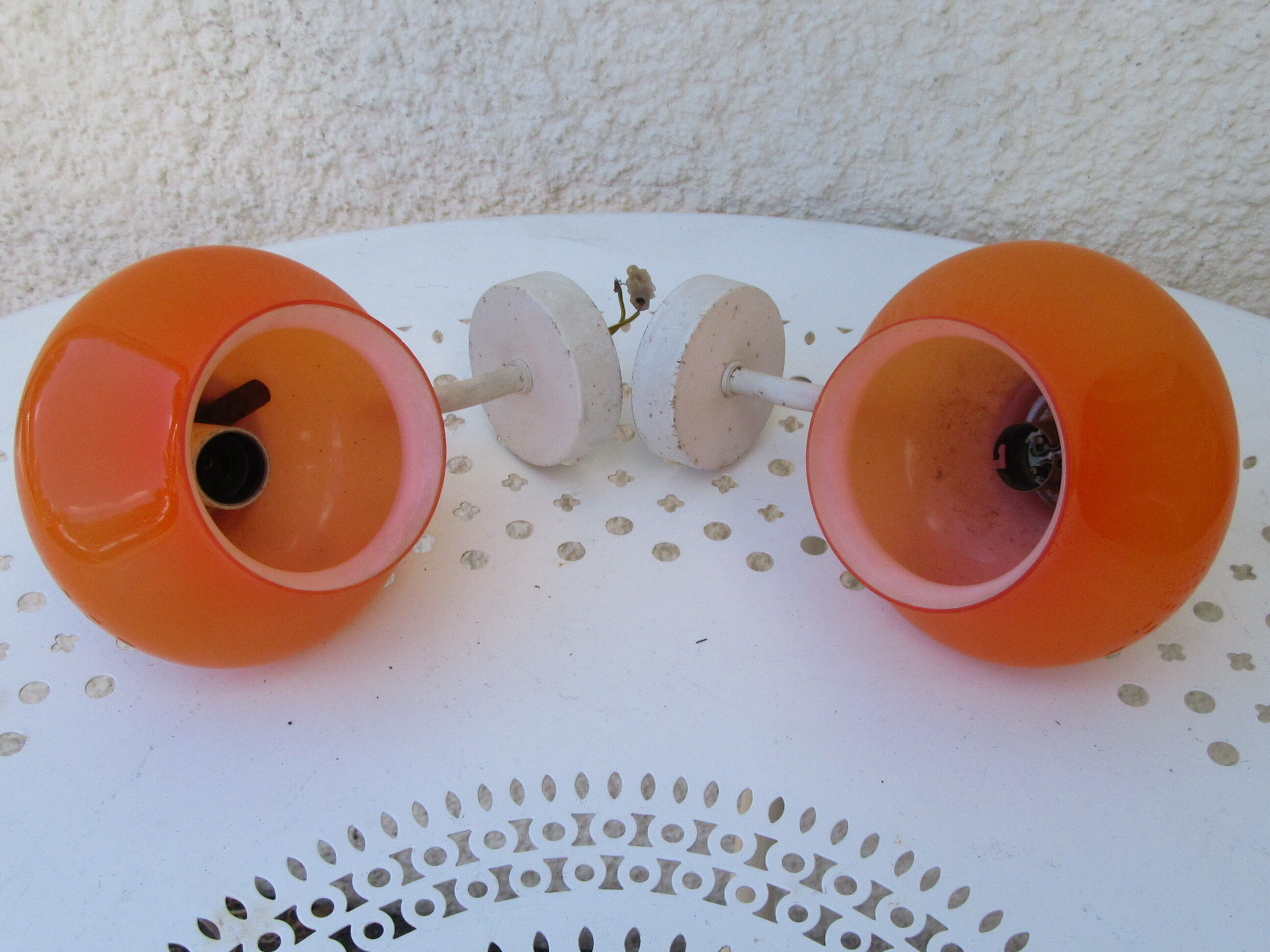 Pair of vintage orange hanging lamps