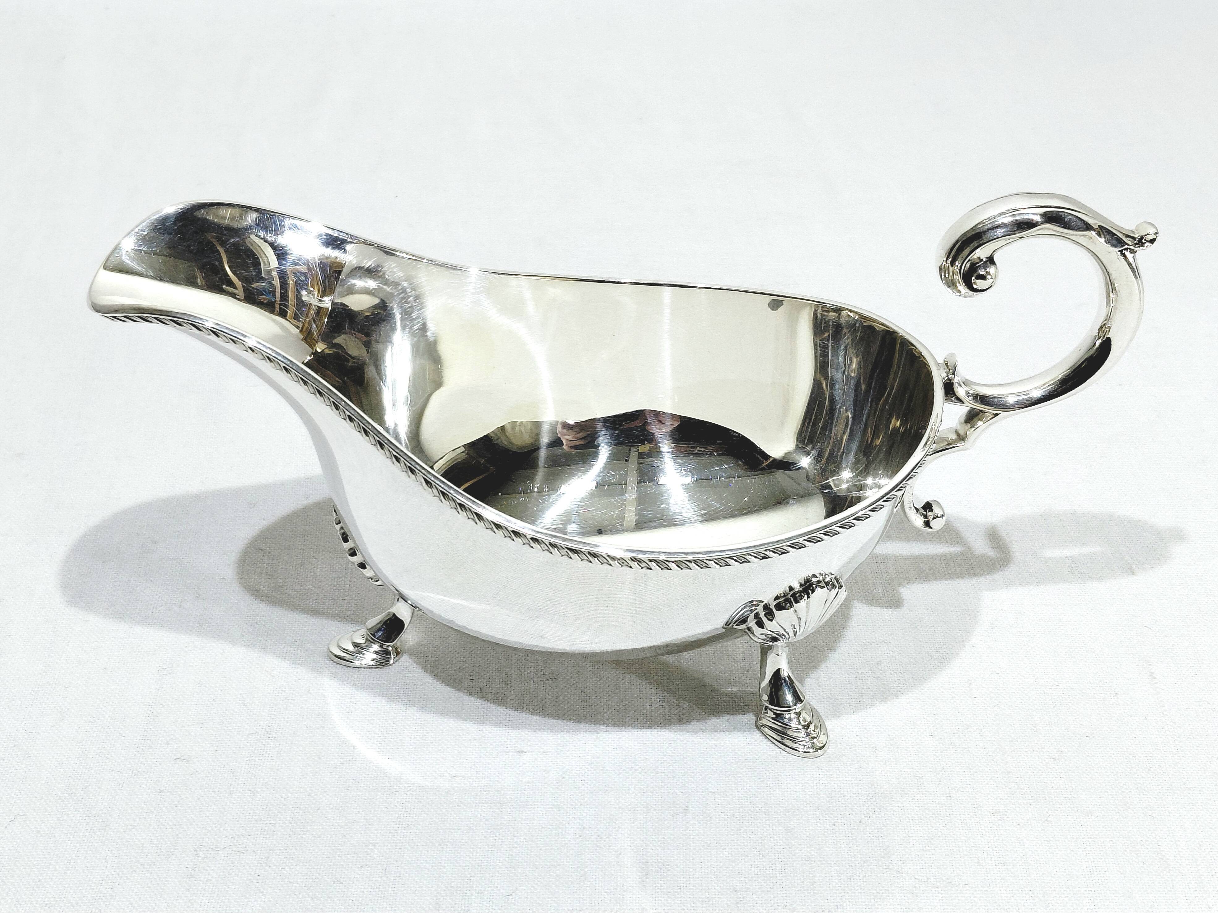 Silver sauceboat, England