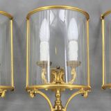 Lot de trois aplliques demi-lune en bronze doré & verre bombé