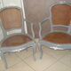 Paire de fauteuils en cannage de style Louis XV