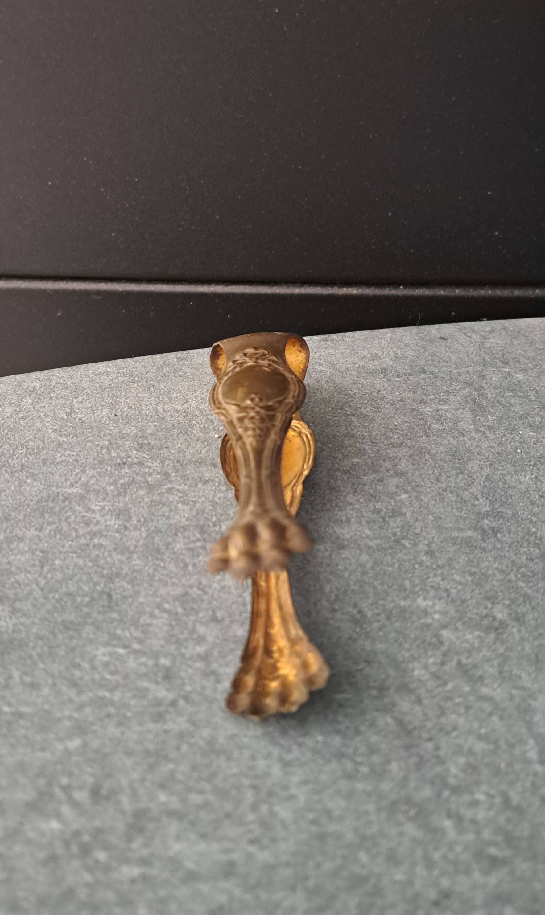 Antique sugar tongs with a system - Lion claws and Louis XV bow decoration.