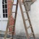 Old wooden stepladder stamped