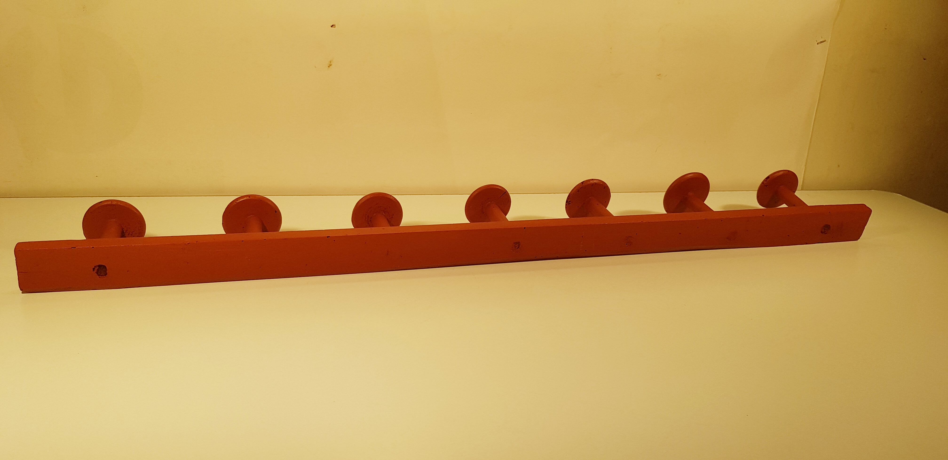 Old wooden wall coat holder