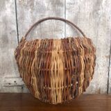 Old grape picker's basket wicker woven vines vintage wine