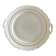 This dish appears to be a serving dish or a round plate with handles made of porcelain.