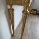 18th-century Italian console in gilded wood with a marble top.