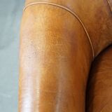 Set of 2 sheep leather club chairs in a cognac color